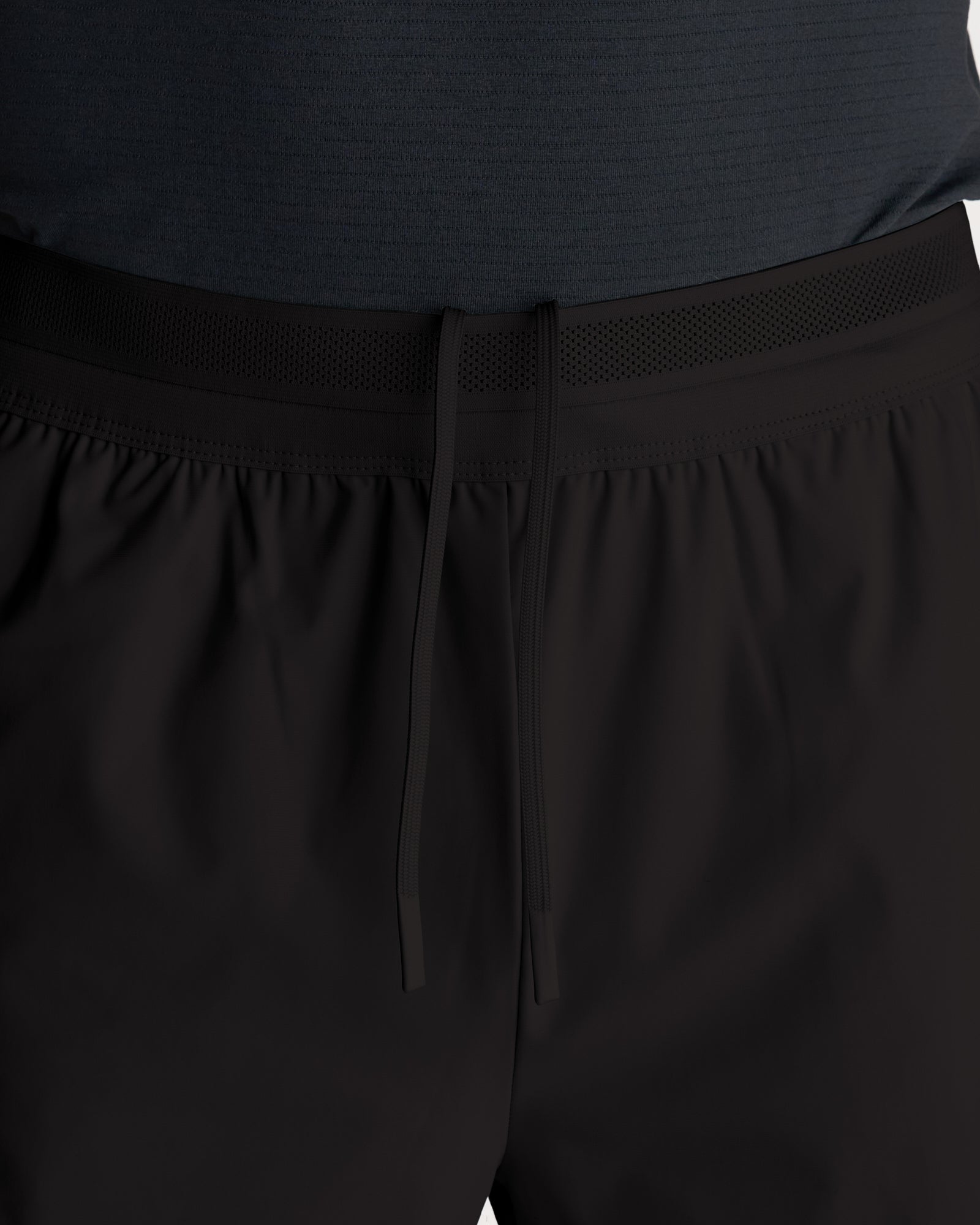 Close-up of the Vapor-Lite Liner Short Cross in black showing the elastic waistband with mesh detailing and drawstring.