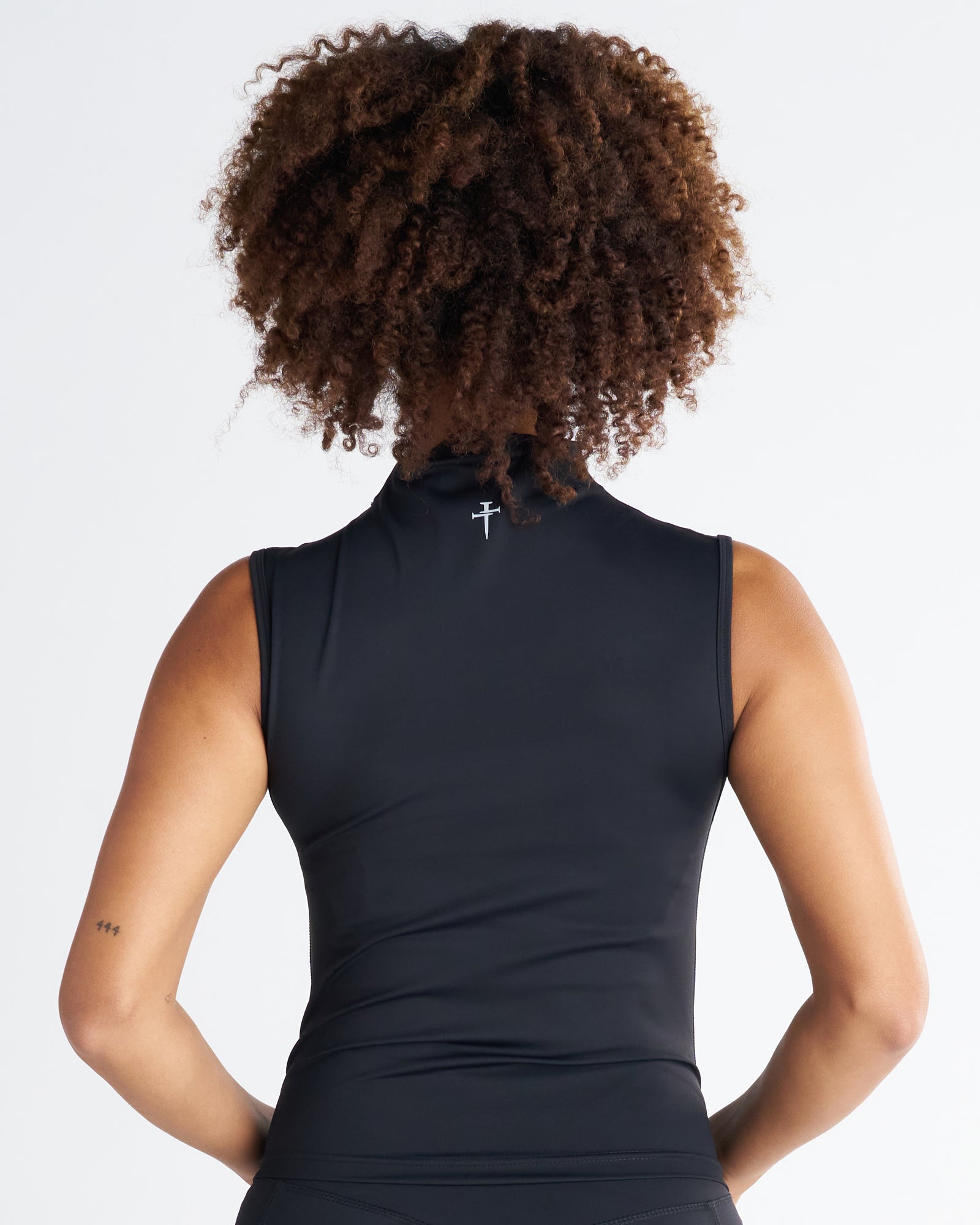 Back view of the Endura-Train Quarter Zip Tank in black, showing the logo detail at the neckline.
