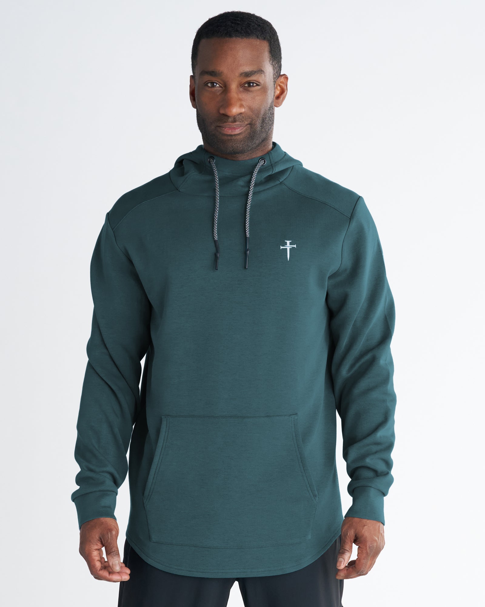 Pro-Tech Hoodie in teal on a male model, front view, featuring a kangaroo pocket and small nail cross logo.