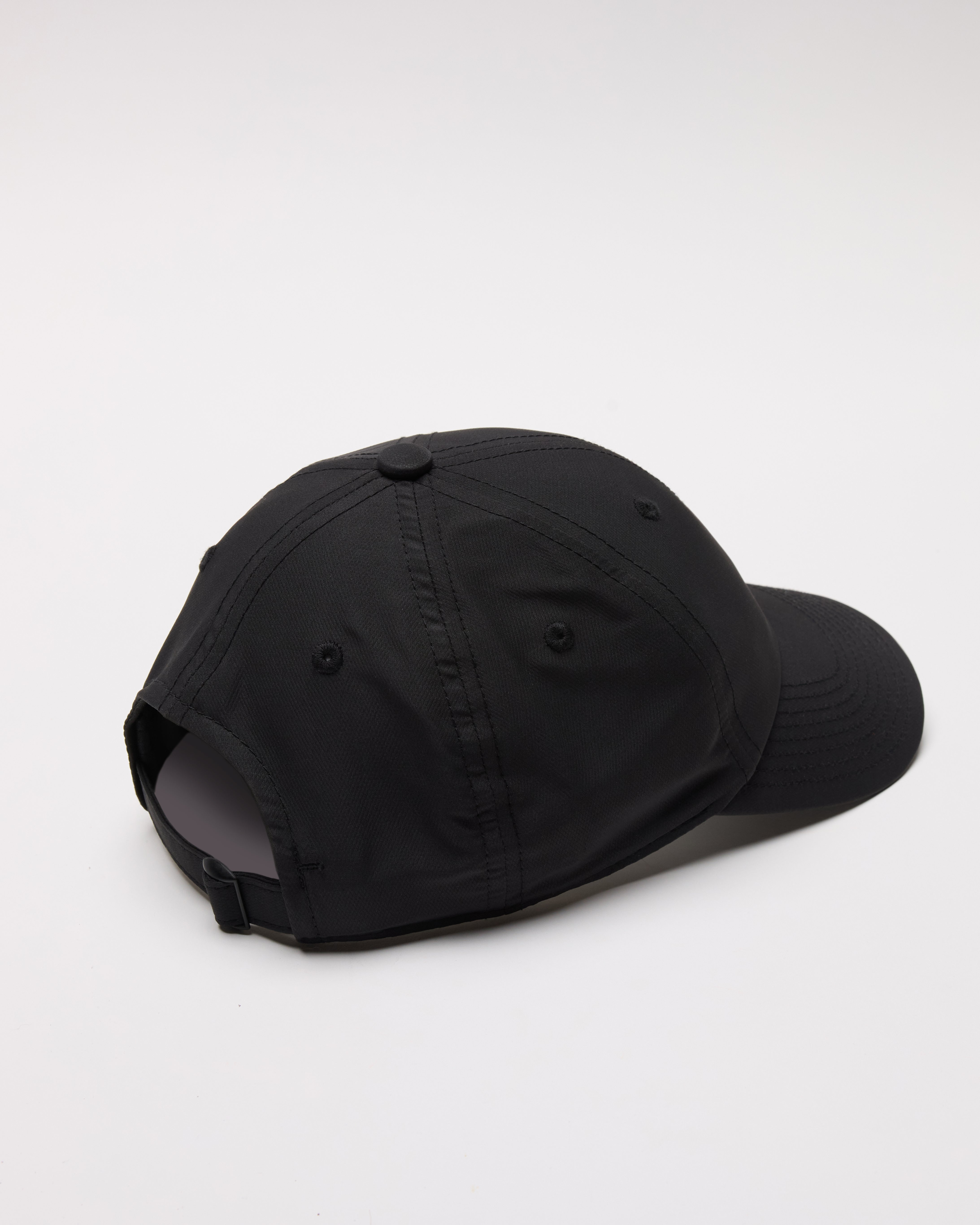 Back view flatlay of the Women's Sport Cap in black showing adjustable strap and six-panel construction.