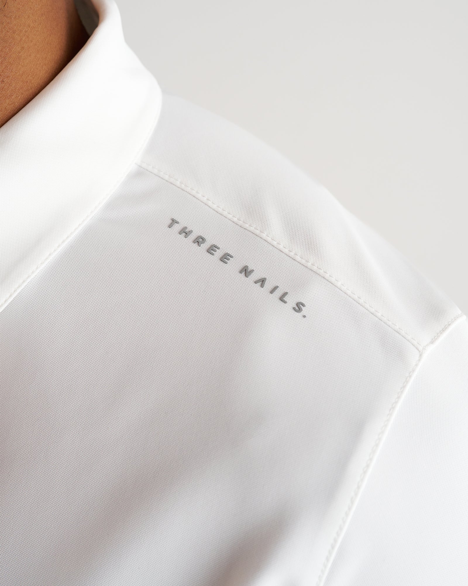 Vented Tech Polo “Three Nails” - White