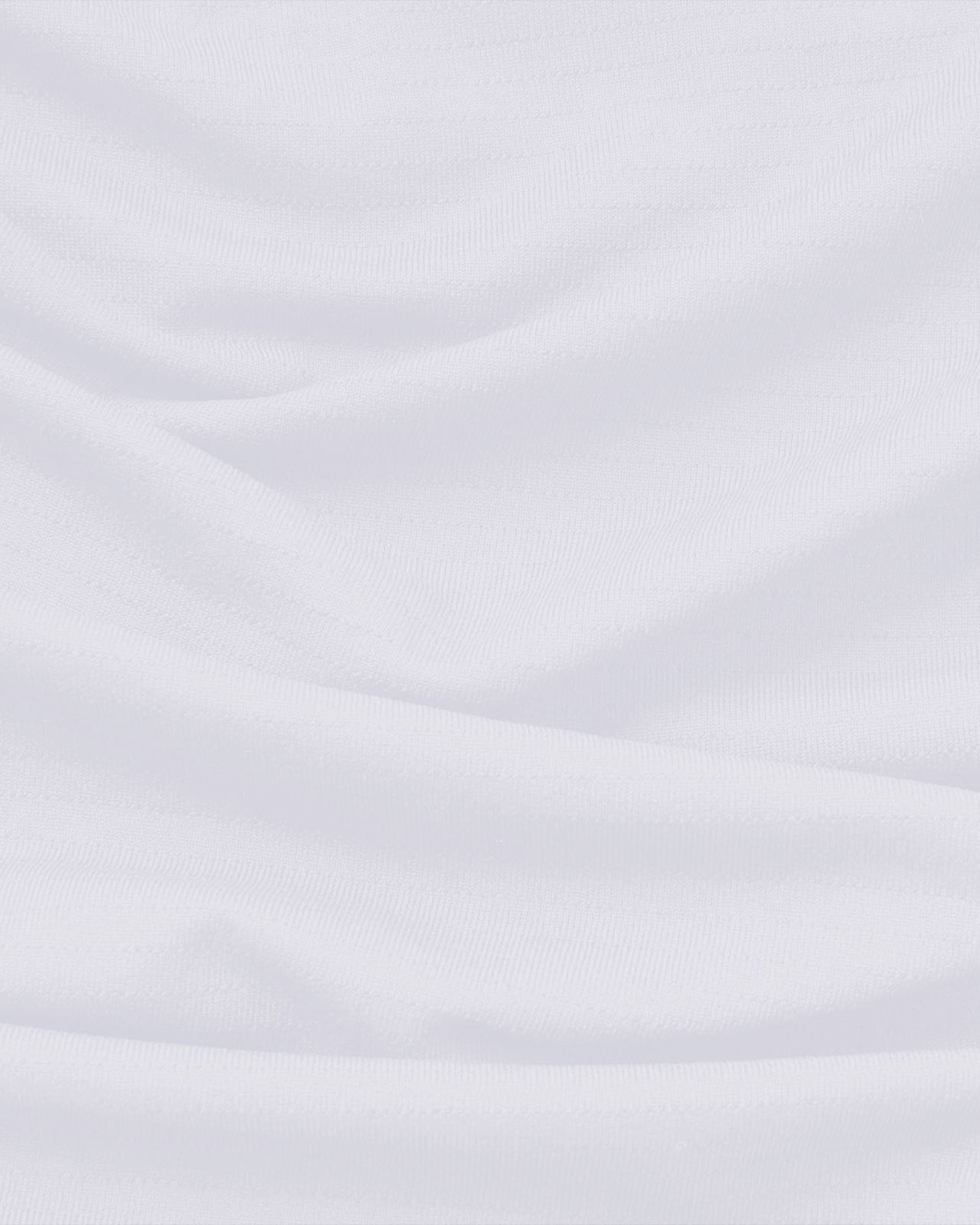 Close-up of the Aion-Lite Tank in white showing smooth fabric texture and drape.