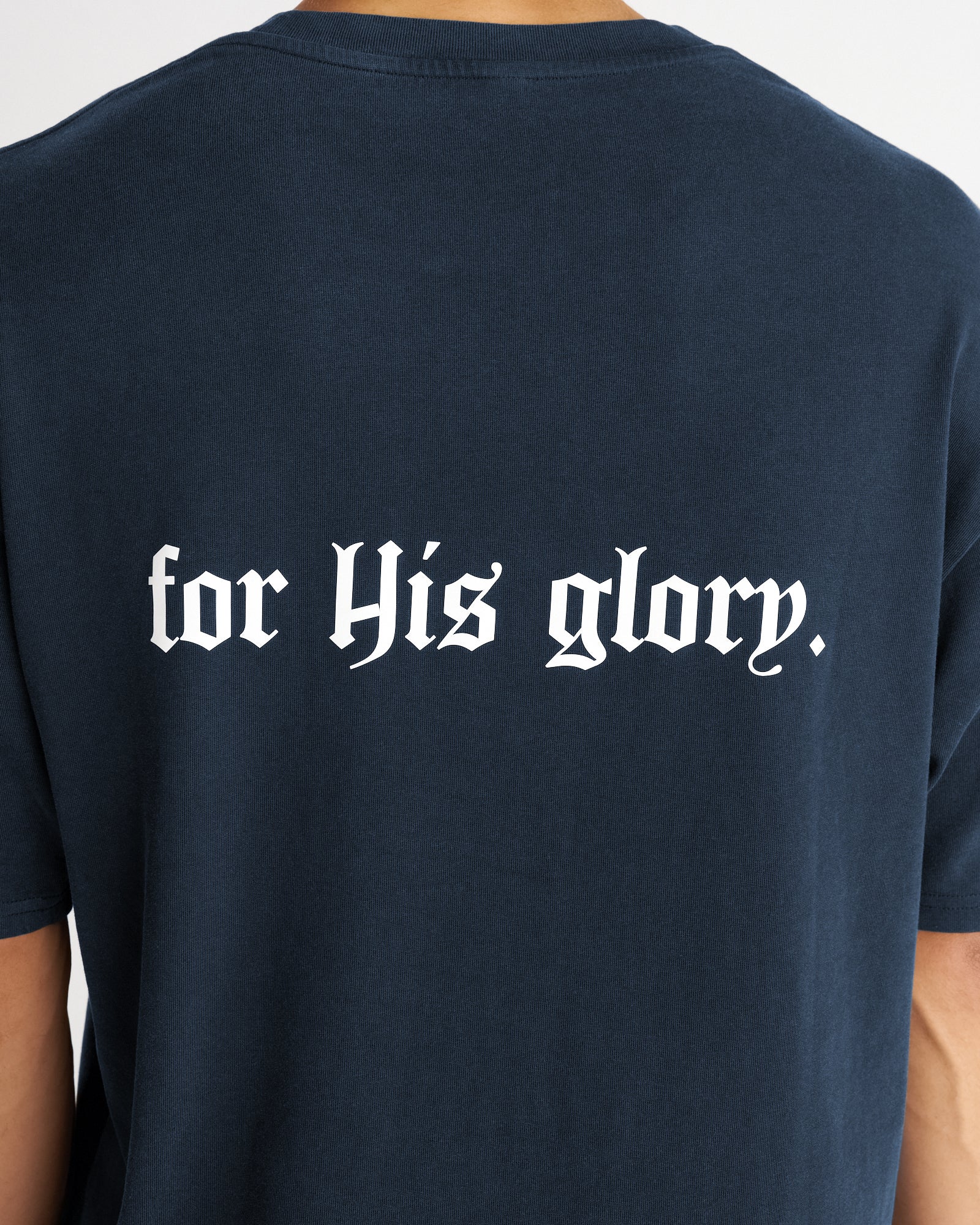 Close-up back detail of the Heavyweight Cotton Oversized Tee FHG in Midnight Navy showing for His glory. gothic print.