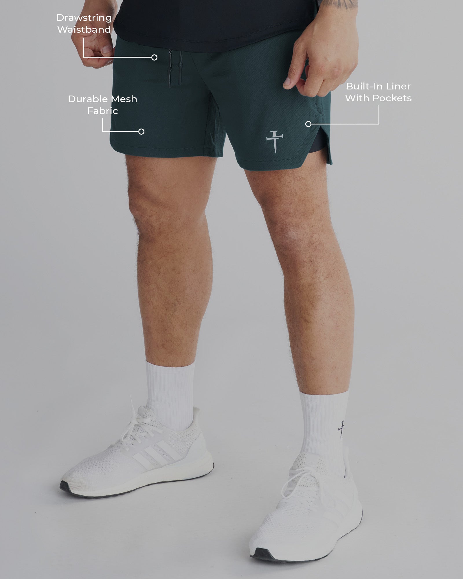 Pro-Tech 2.0 Liner Short in Teal shown on a model from a front side angle with feature callouts.