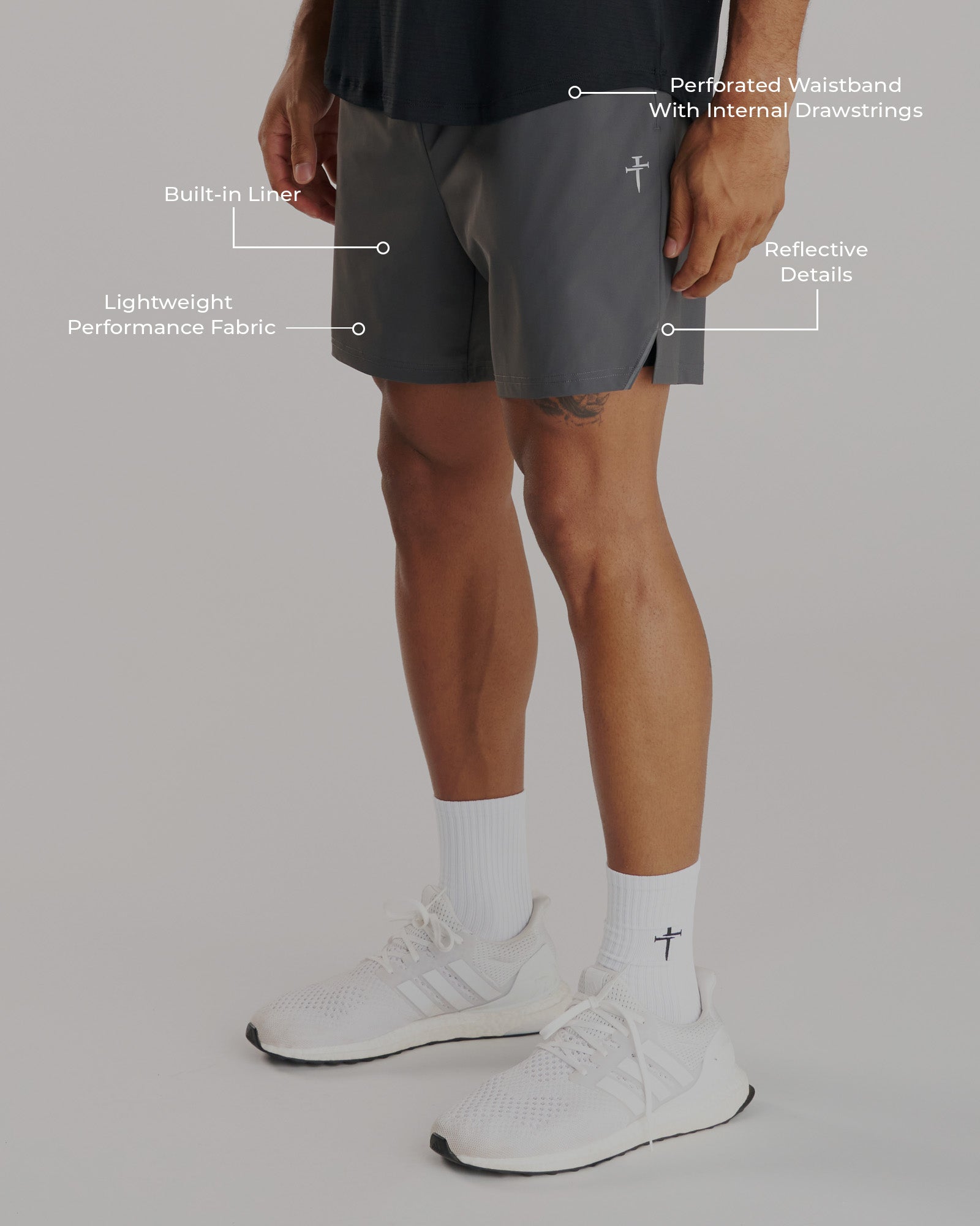 Side angle view of Space Grey Vapor-Lite Liner Short with labeled features including built-in liner and perforated waistband.
