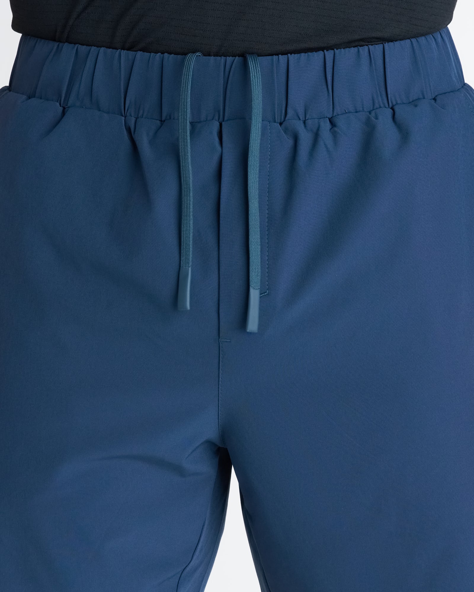 Close-up of Pulse Tech Liner Short in Midnight Navy showing elastic waistband and tonal drawstring detail.