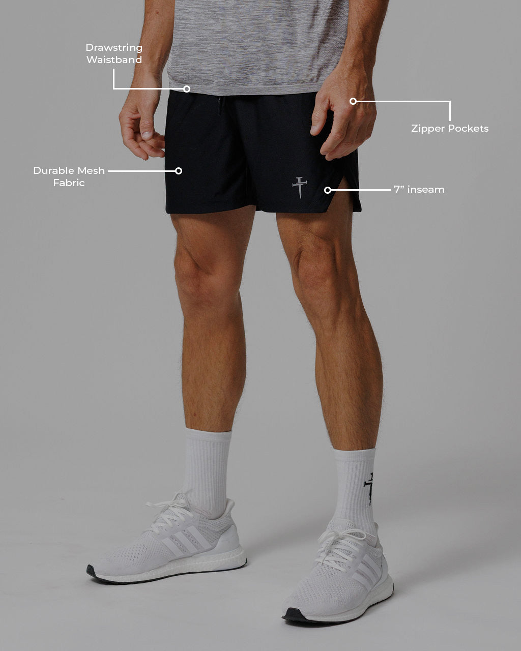 Front view of Pro-Tech 2.0 Linerless Short in Black on male model with feature callouts.