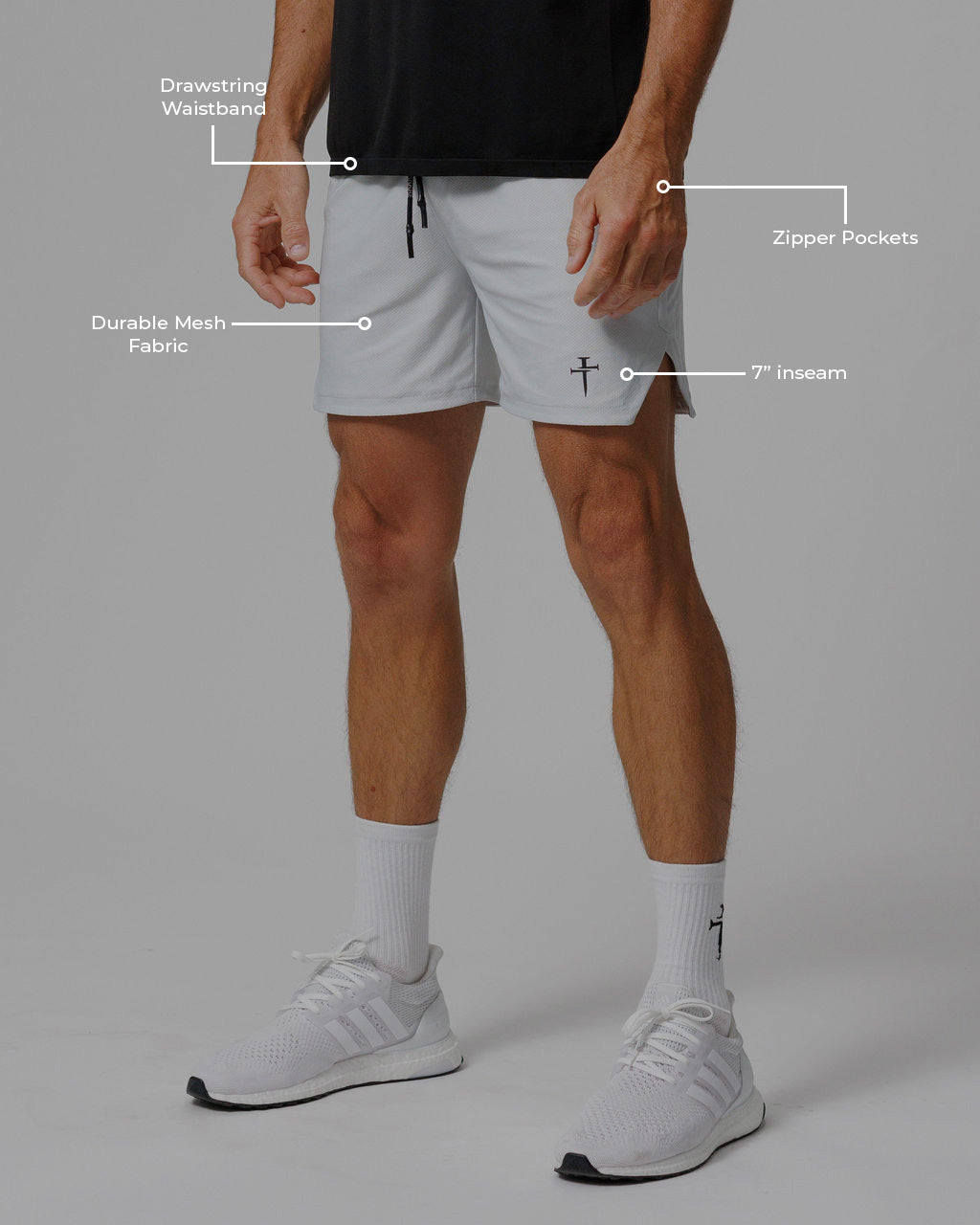 Front view of Pro-Tech 2.0 Linerless Short in Stone on a male model, with callout labels highlighting key features.
